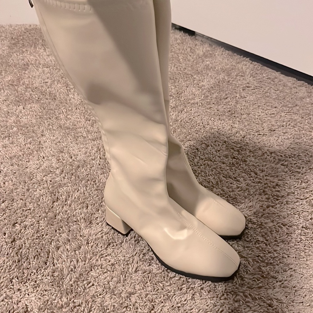Cream knee height boots. Size 7.5